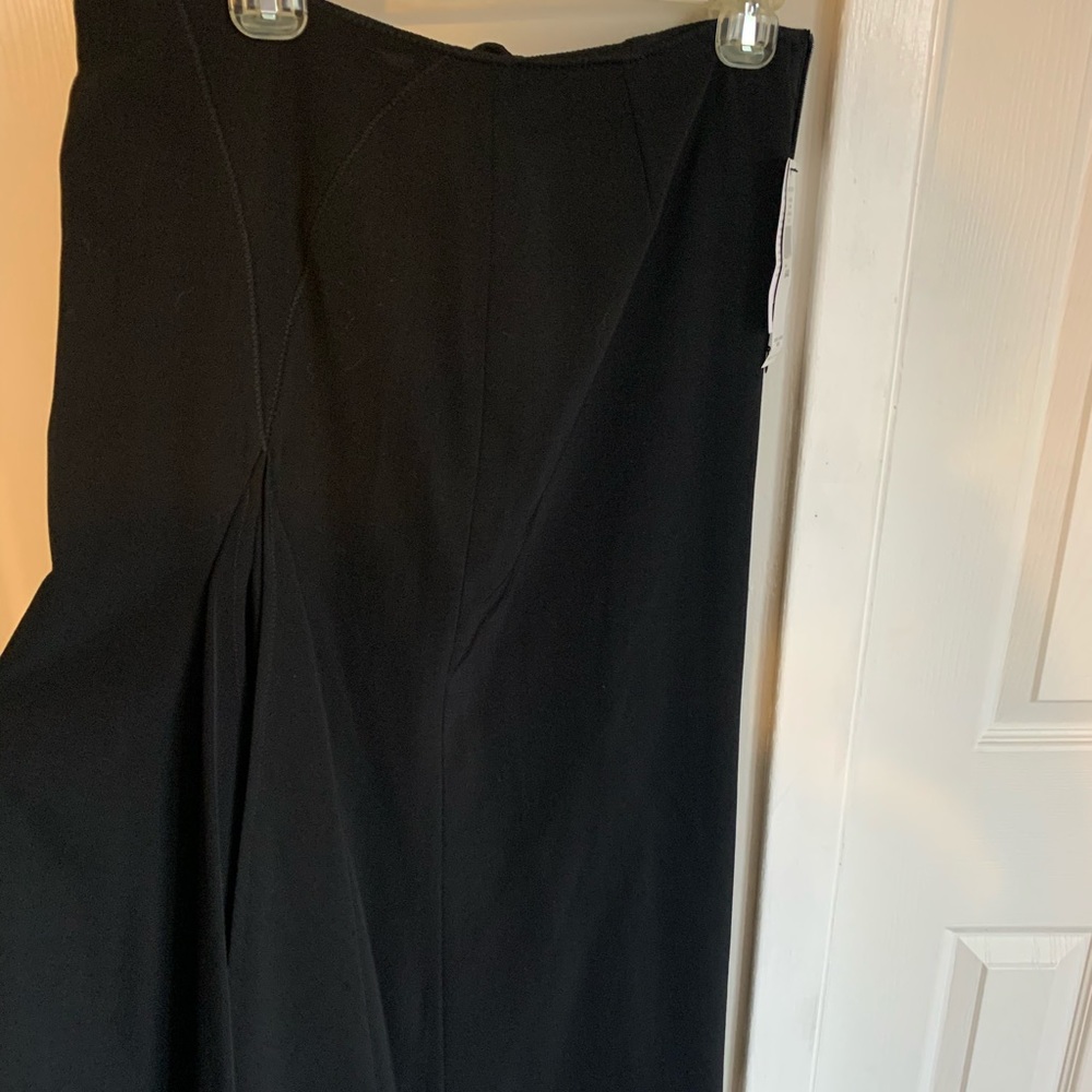 Black skirt with big front slit. Brand new.